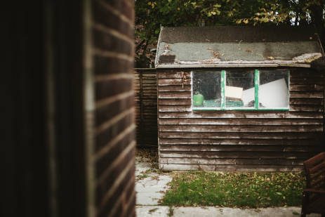 A shed with a window and a door